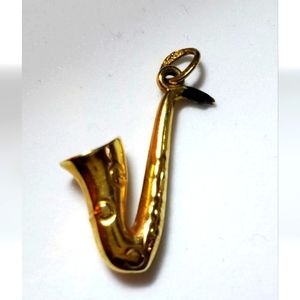 14k gold Saxophone Charm Pendant.  Little Switzerland.